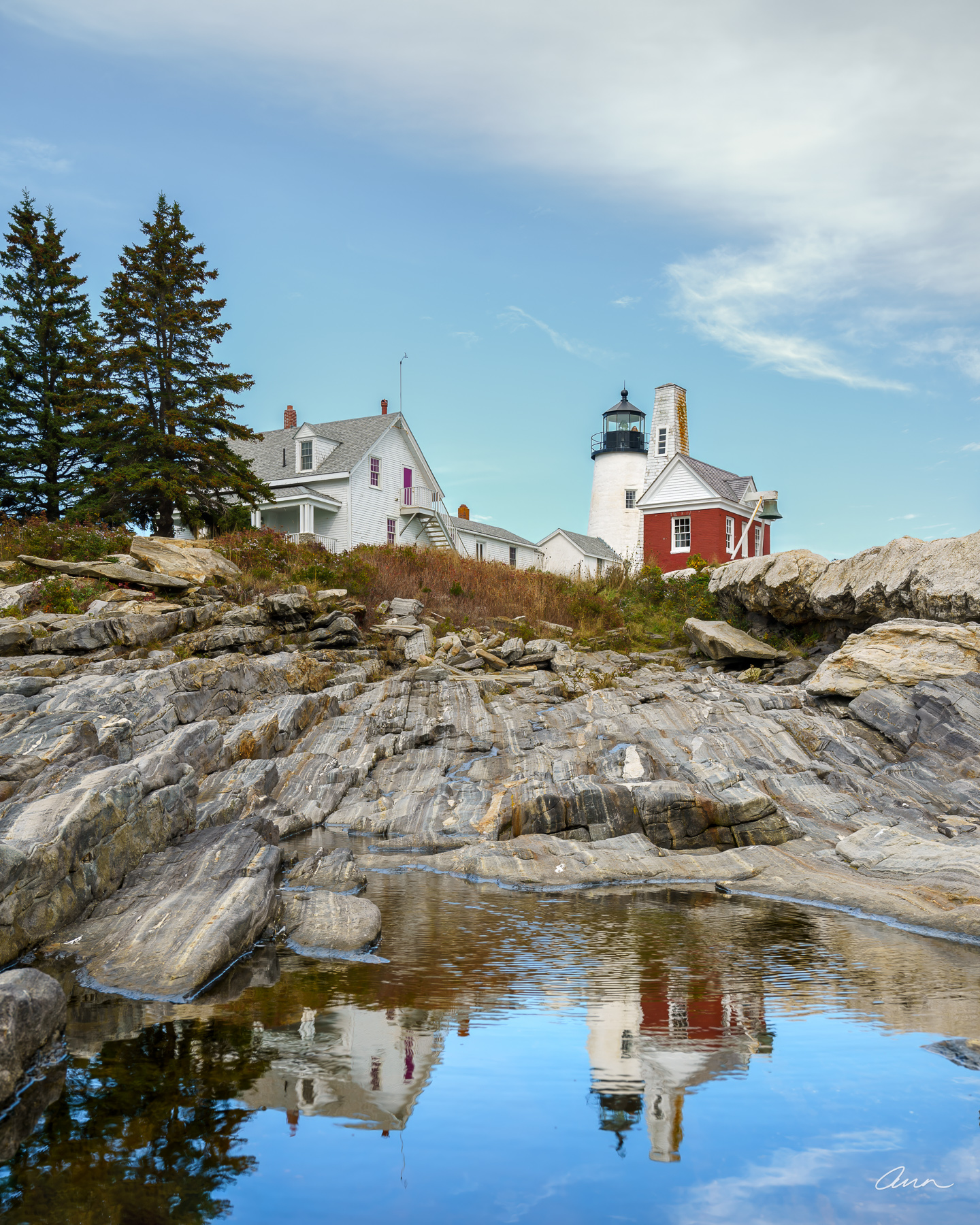 Pemaquid Point Lighthouse reflecting in tide pool.