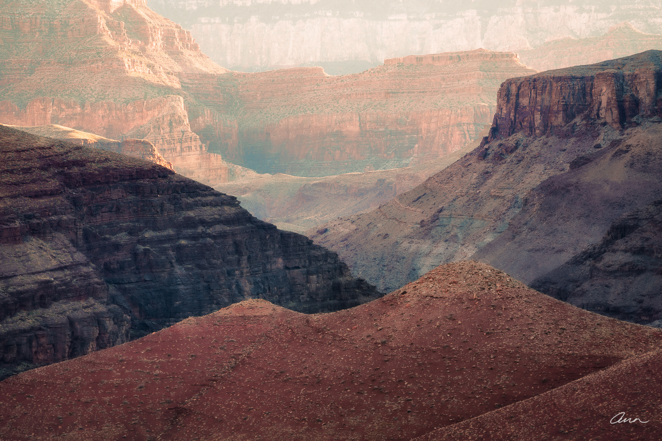 Layers in the Grand Canyon show some plateaus in shadow, others in light.