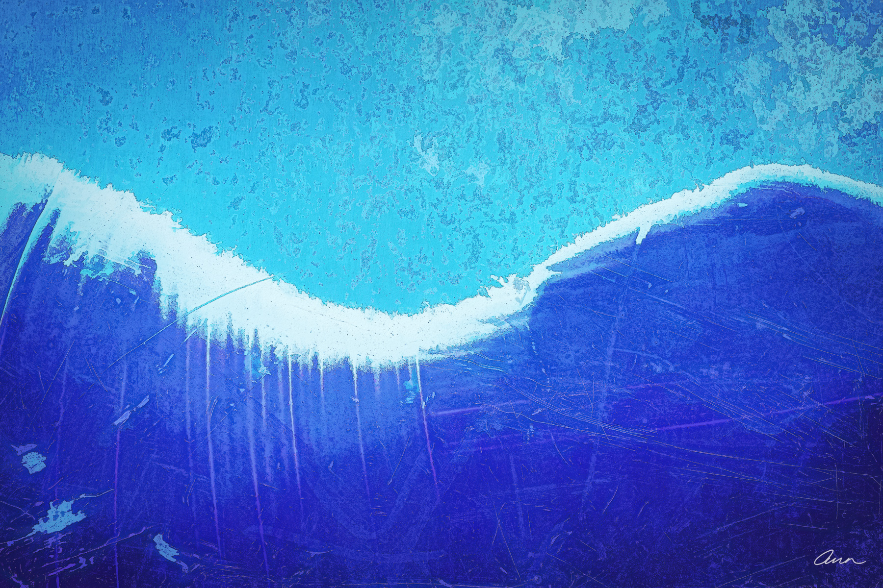 Close-up of metal scrapes and paint overspray that looks like an ocean with foam spilling over the top of the wave.