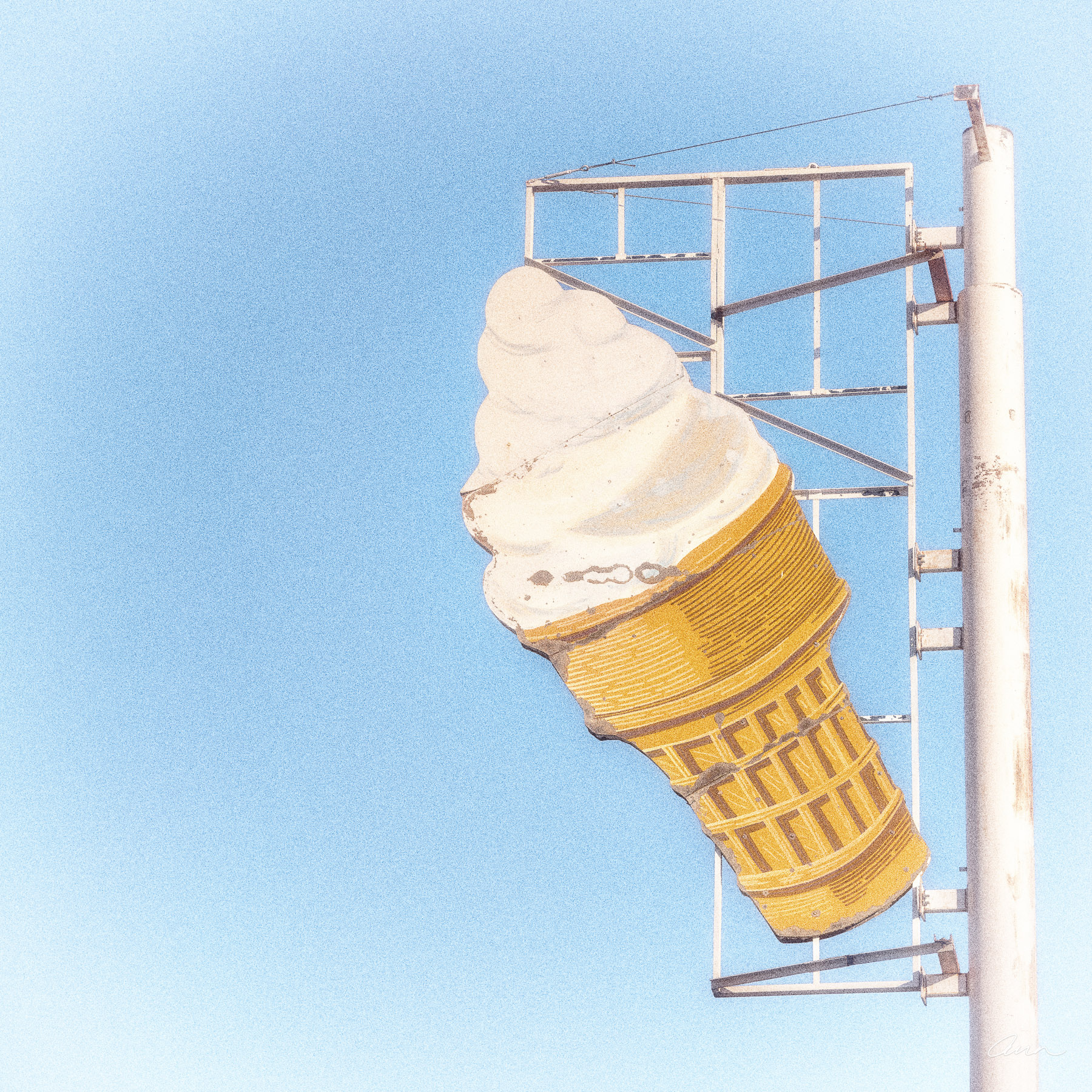 Vintage road sign of swirl ice cream cone